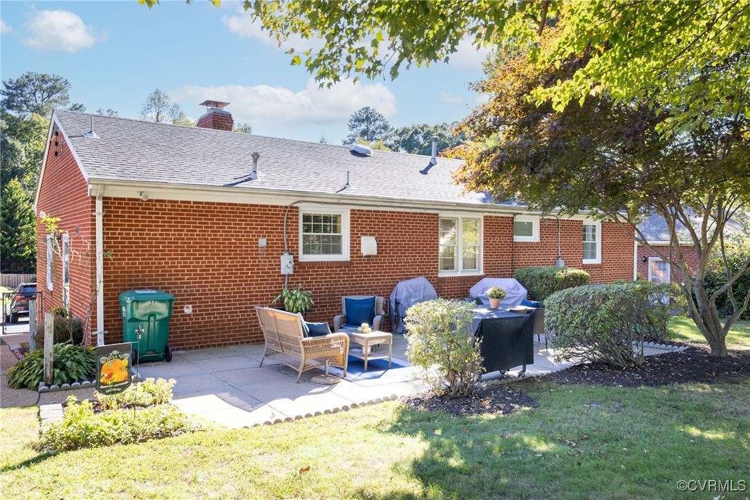 7518 Comet Road Henrico, VA 23294 - Photo 36 of 46 Back of house with a very level yard and a large p