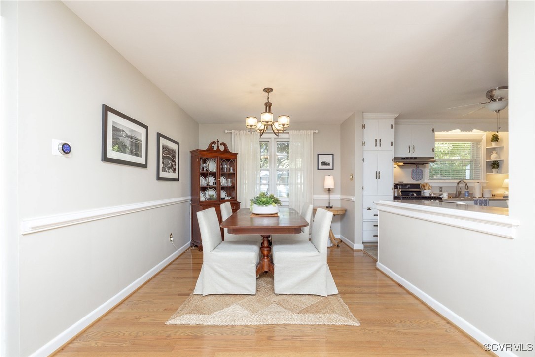 7518 Comet Road Henrico, VA 23294 - Photo 10 of 46 Dining area with light hardwood floors and a timel