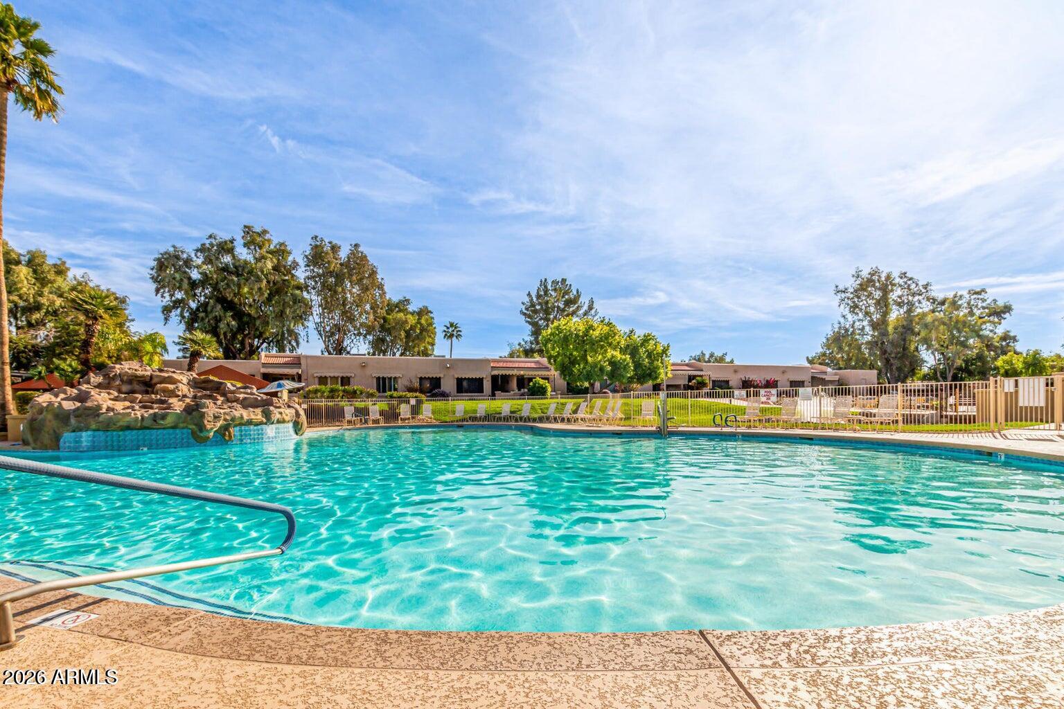 14300 West Bell Road, Unit 420 Surprise, AZ 85374 - Photo 27 of 27 a view of a lake with a big yard