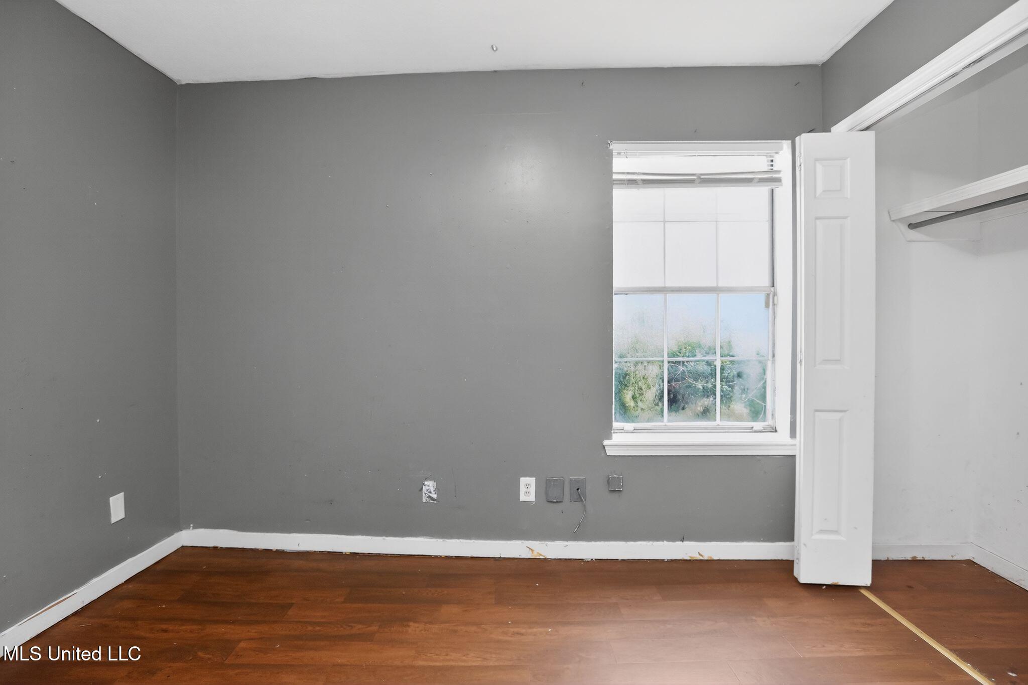 5571 Tiki Lane Jackson, MS 39212 - Photo 17 of 32 26_5571_Tiki_Ln_Jackson_MS_39212-Bedroom