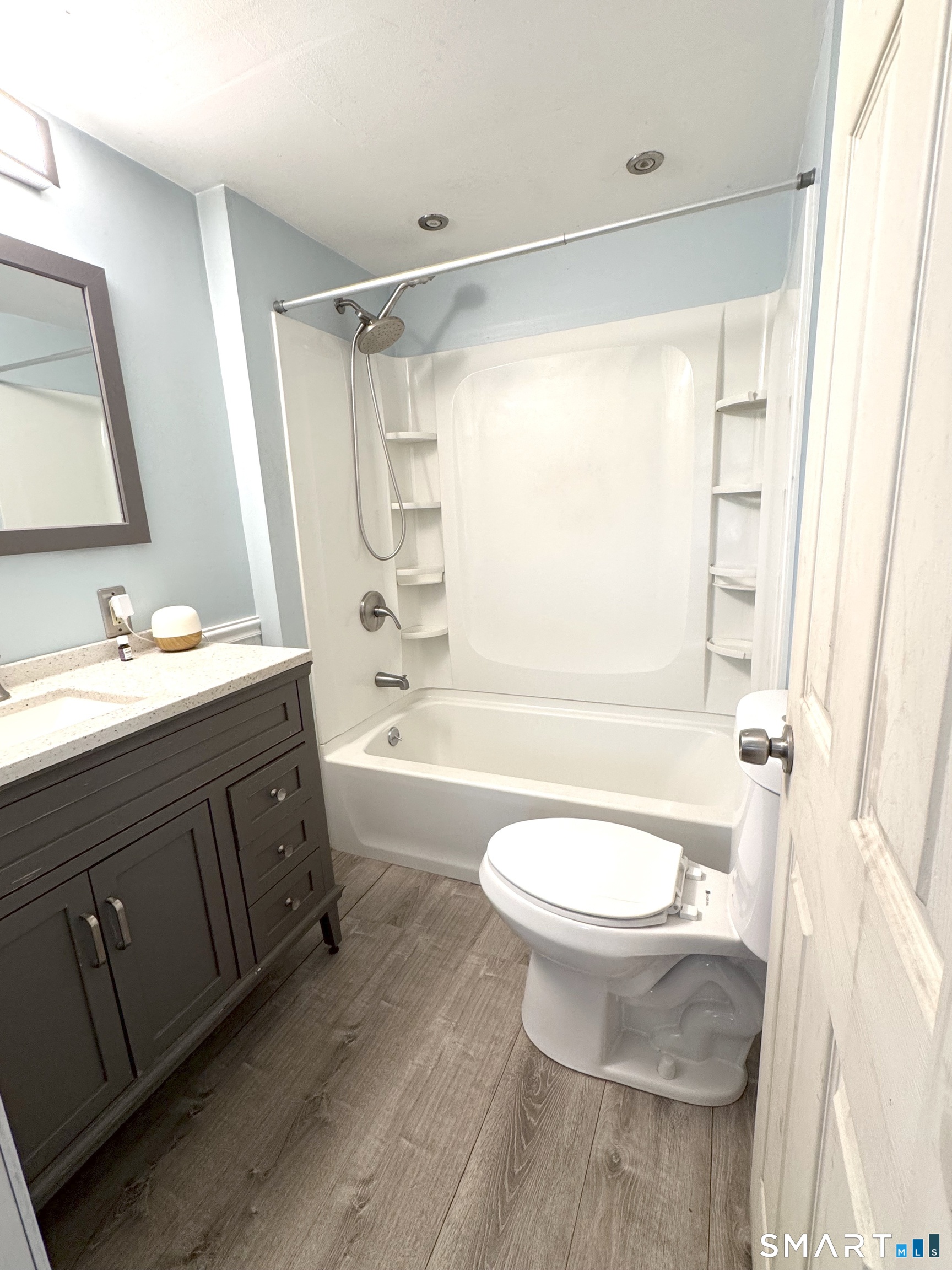 6-8 Vose Street Ansonia, CT 06401 - Photo 12 of 37 Updated Bathroom with Bluetooth speaker in exhaust fan