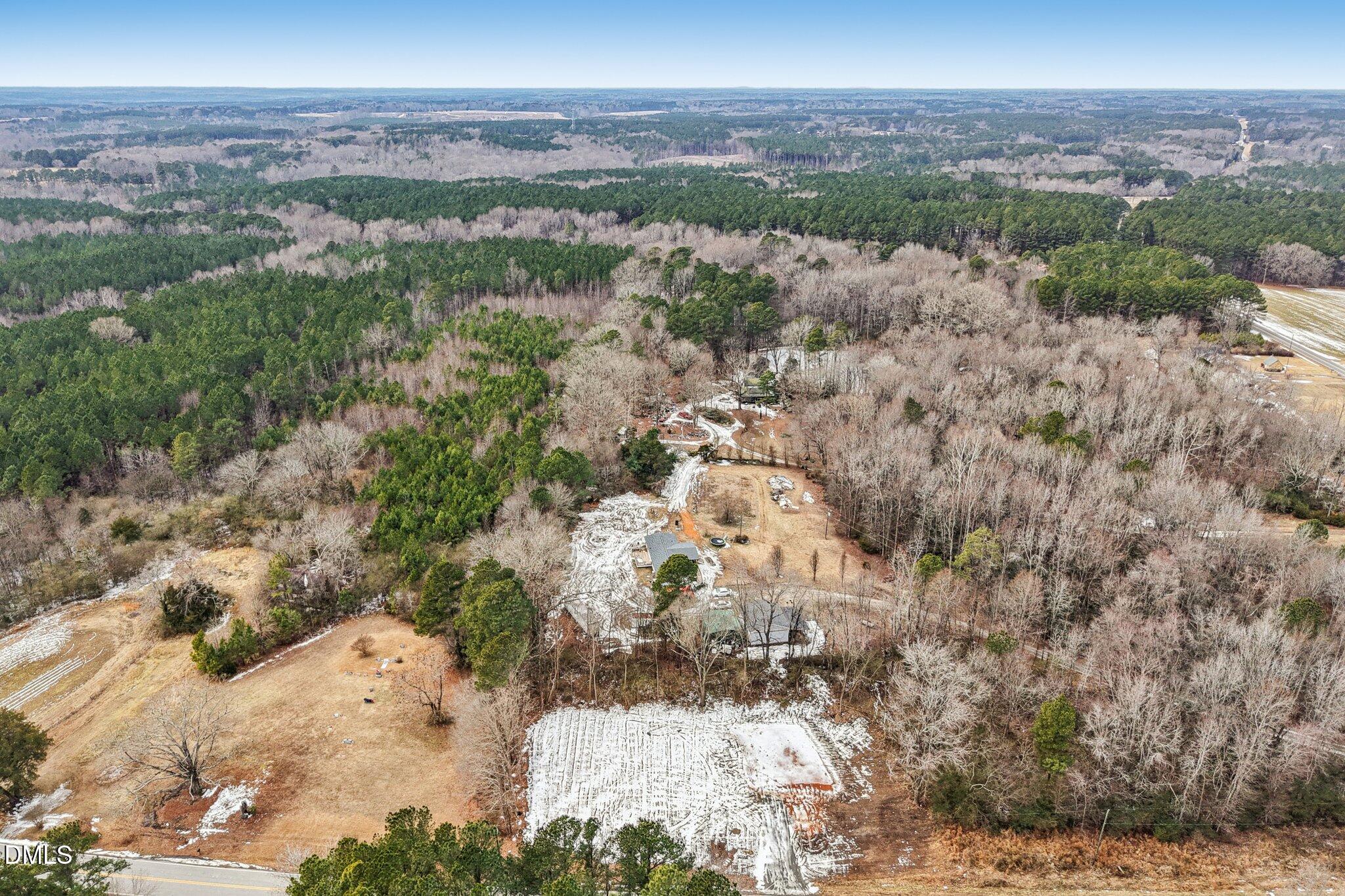 3265 Sims Bridge Road Kittrell, NC 27544 - Photo 13 of 14 a view of a big yard with lots of trees