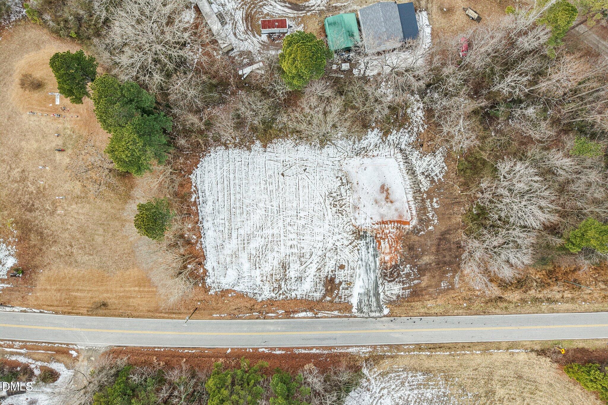 3265 Sims Bridge Road Kittrell, NC 27544 - Photo 14 of 14 a white house with a outdoor space
