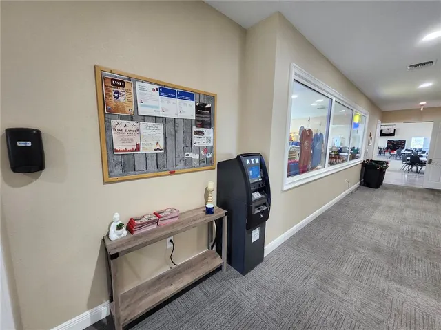 a living room with lots of furniture and a flat screen tv