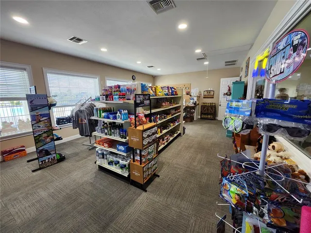 a room with gym equipment and a large window