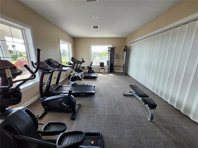 a view of a terrace with sitting area