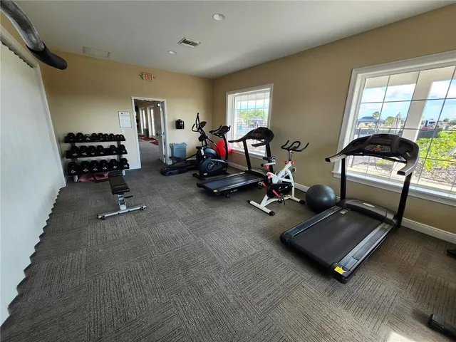 a view of a swimming pool and deck