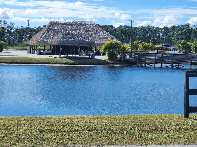 a view of a swimming pool with a patio