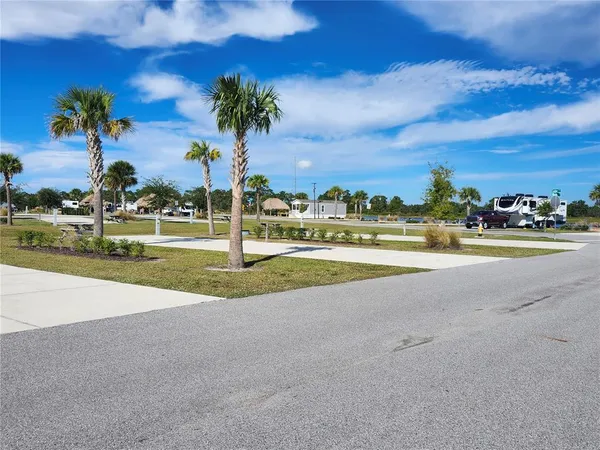a view of street with houses with outdoor space