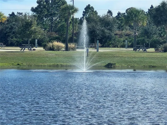 a view of the house with swimming pool
