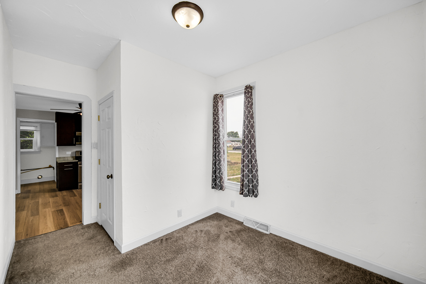 110 Wood Elwood, IL 60421 - Photo 11 of 23 an empty room with windows