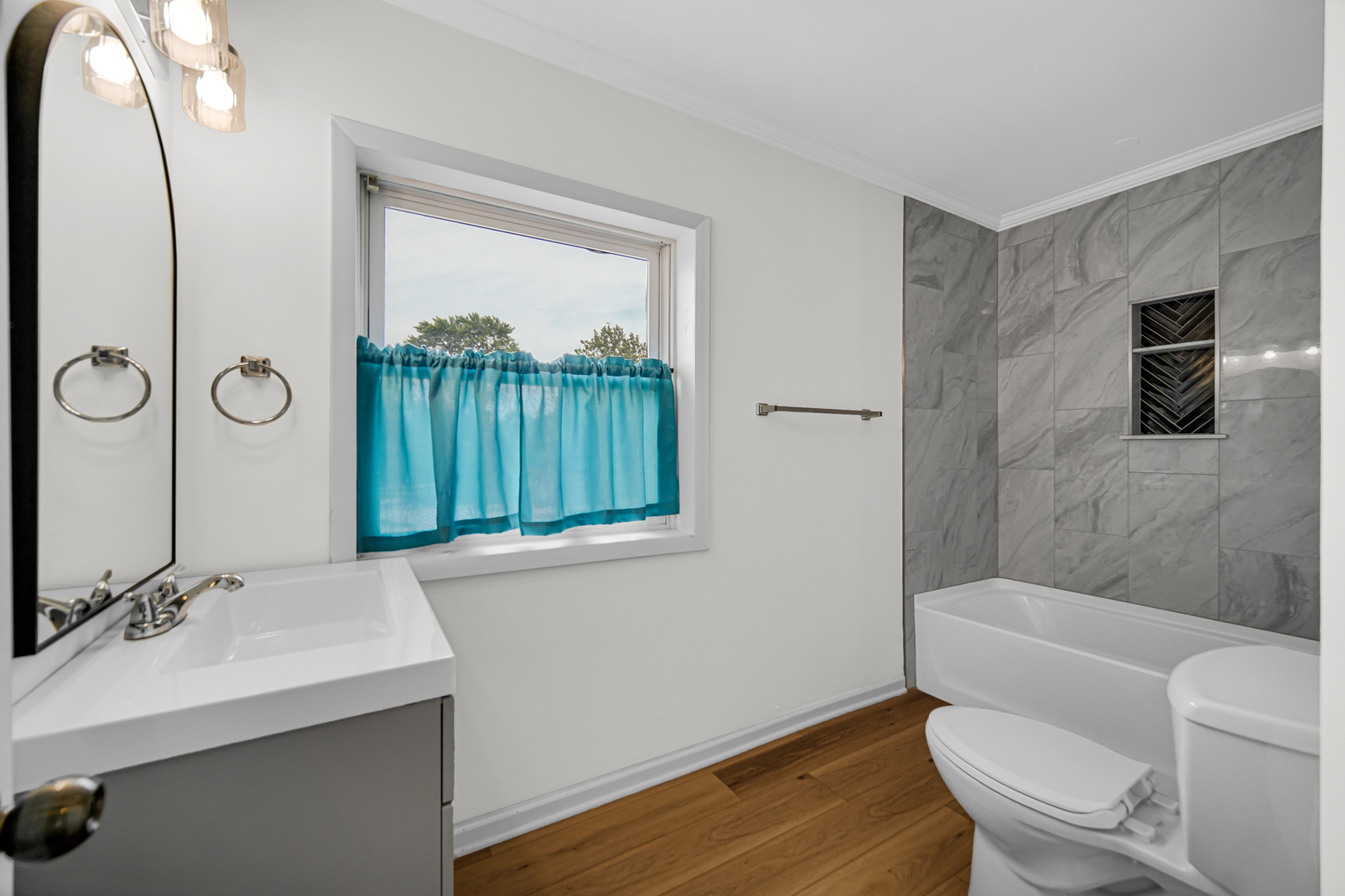 110 Wood Elwood, IL 60421 - Photo 20 of 23 a bathroom with a sink a toilet and a mirror