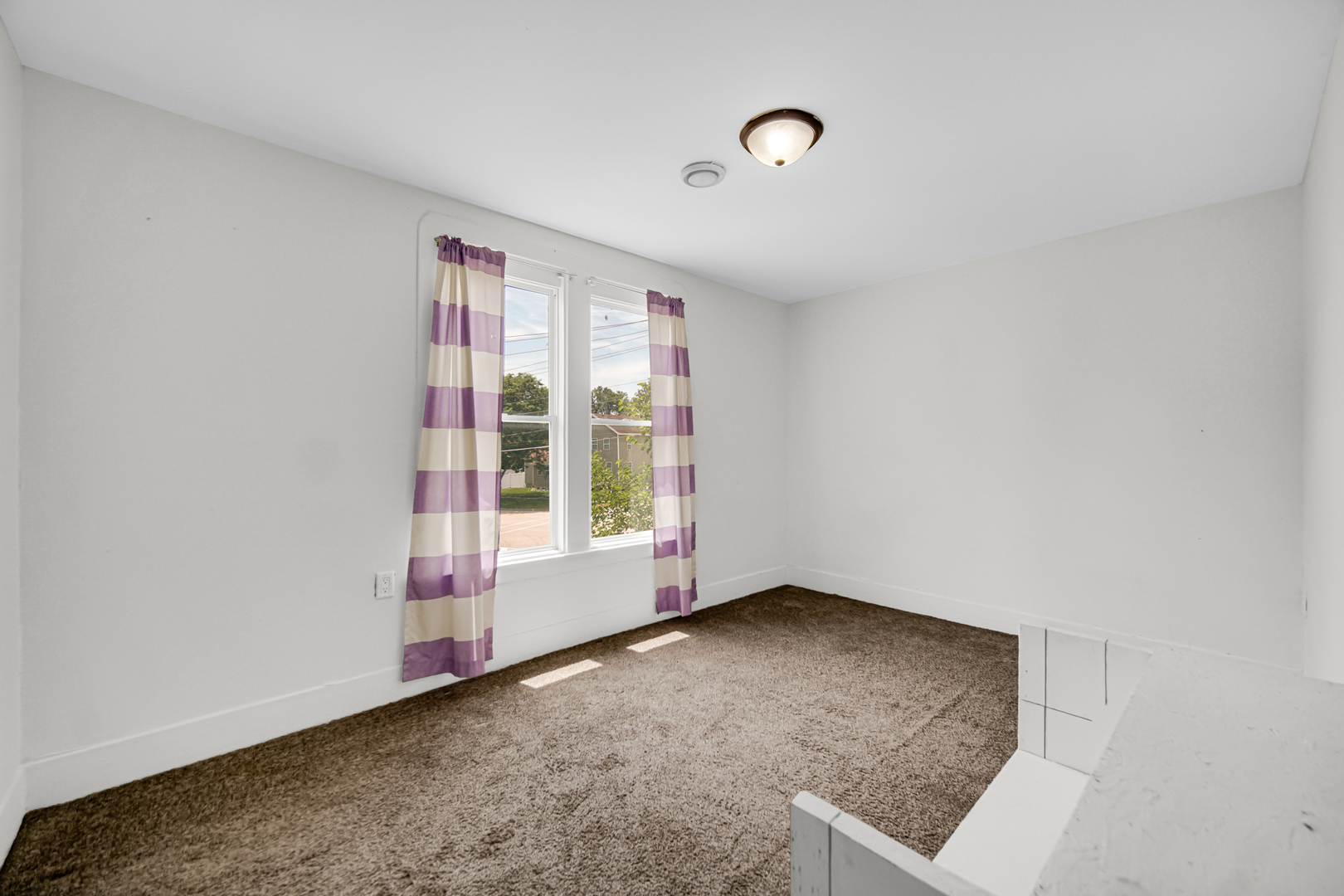 110 Wood Elwood, IL 60421 - Photo 21 of 23 an empty room with windows