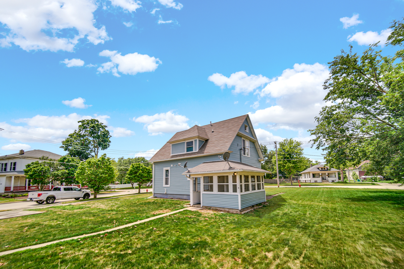 110 Wood Elwood, IL 60421 - Photo 3 of 23 a front view of a house with garden
