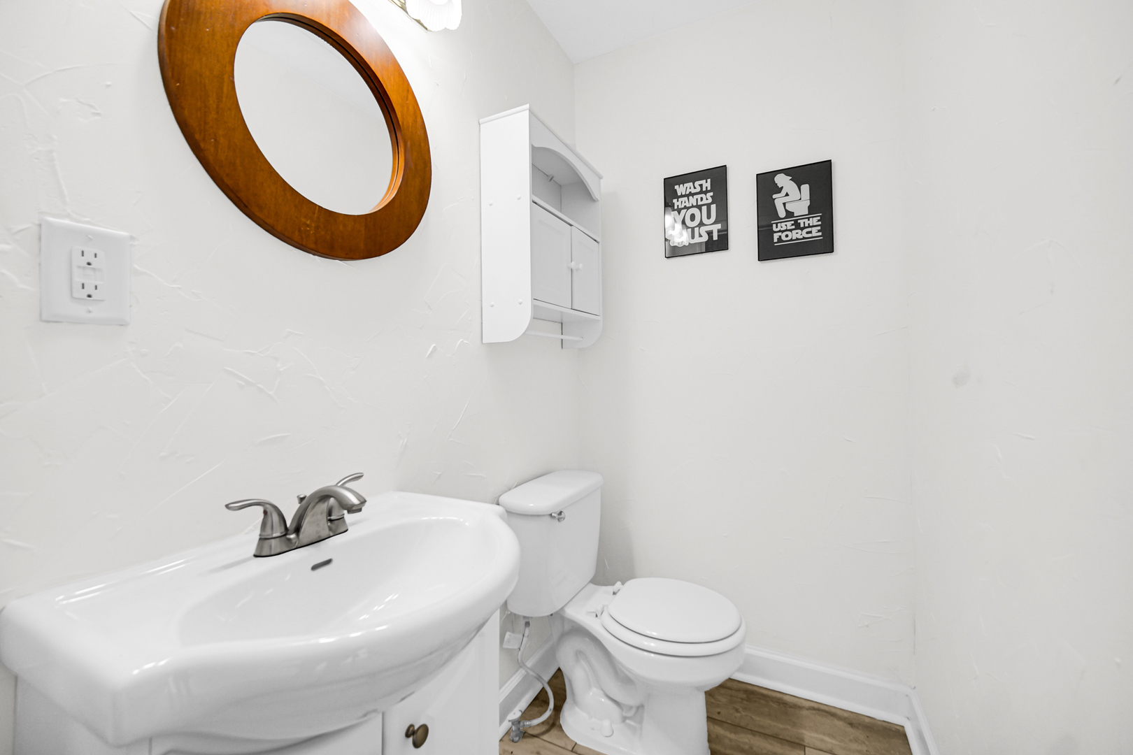 110 Wood Elwood, IL 60421 - Photo 10 of 23 a bathroom with a sink and a mirror