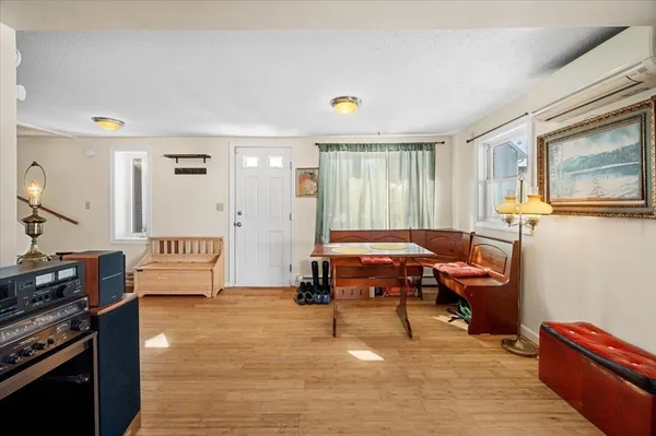 a room with furniture and gym equipment