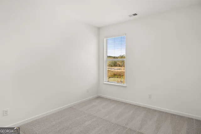 a bathroom with a bathtub shower sink and a toilet