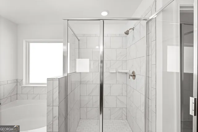 a view of a hallway with entryway