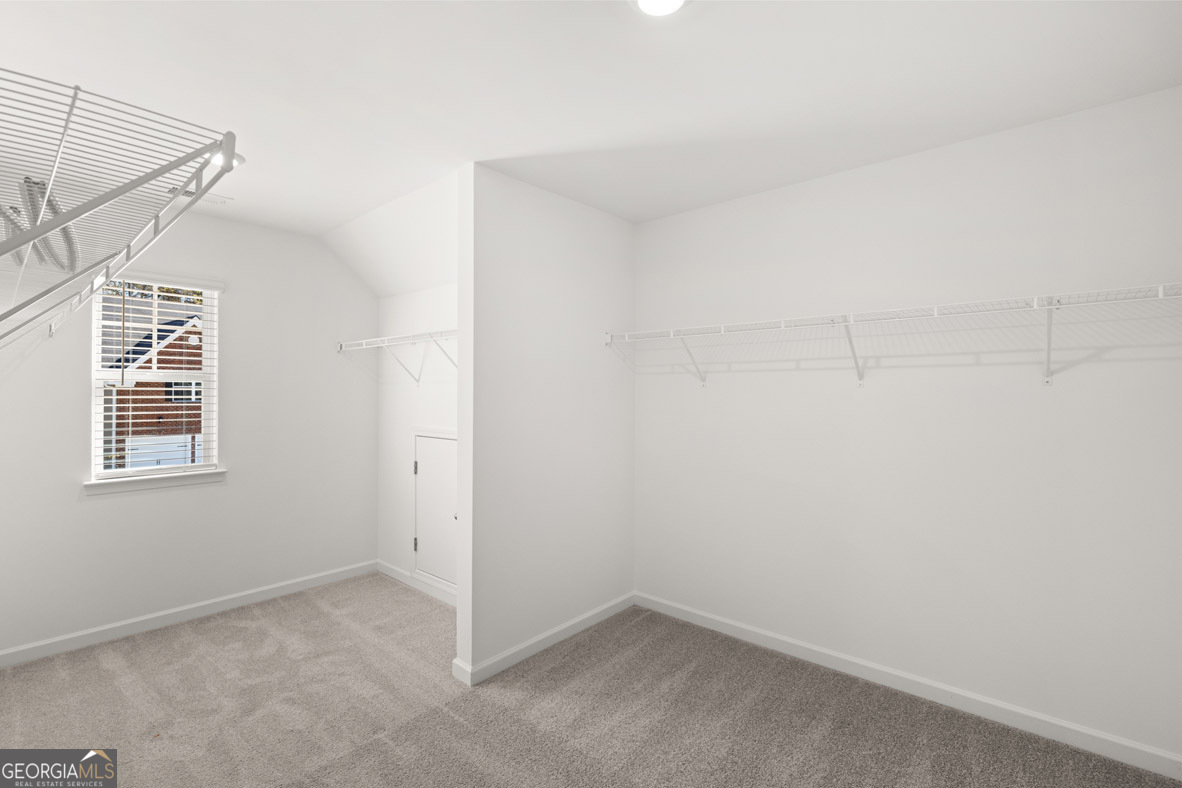 400 Hazel Drive Locust Grove, GA 30248 - Photo 37 of 50 a view of a room with rack on the wall