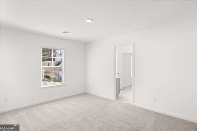 an empty room with a window