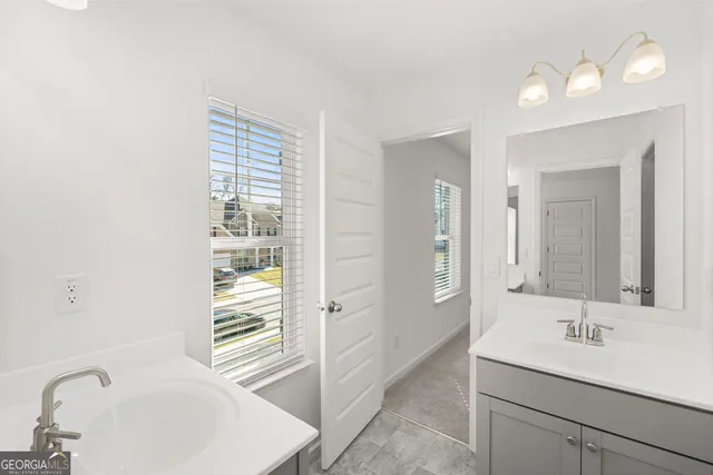 an empty room with a bathroom