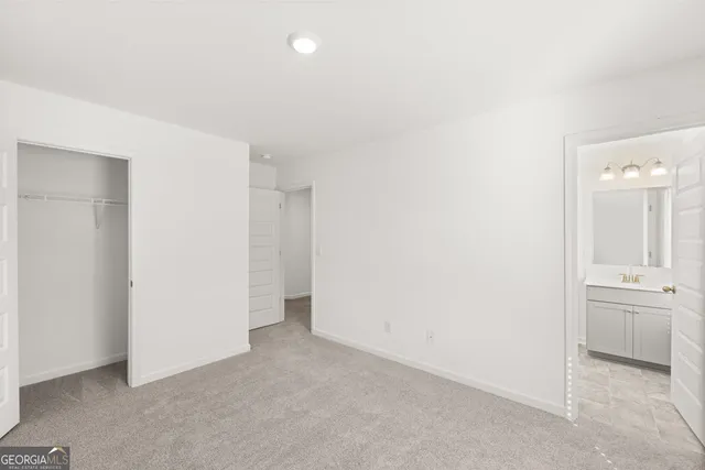 a bathroom with a bathtub and a toilet