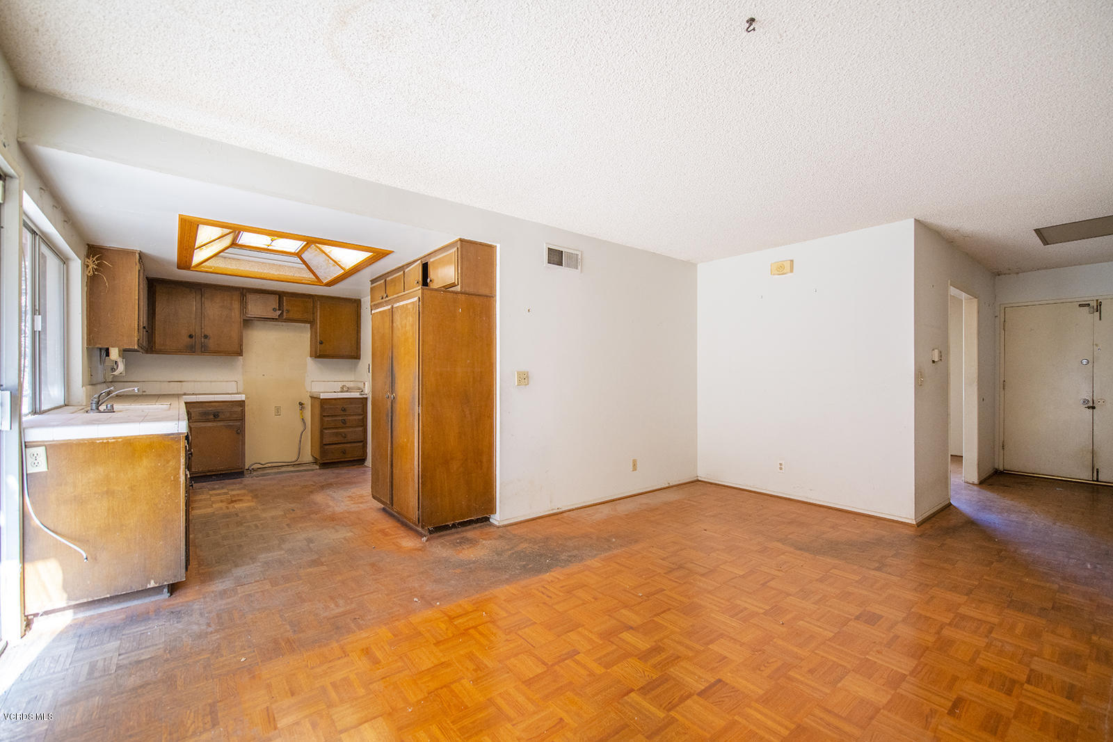 4435 Erbes Road Thousand Oaks, CA 91360 - Photo 4 of 14 a view of a kitchen with a sink and a refrigerator
