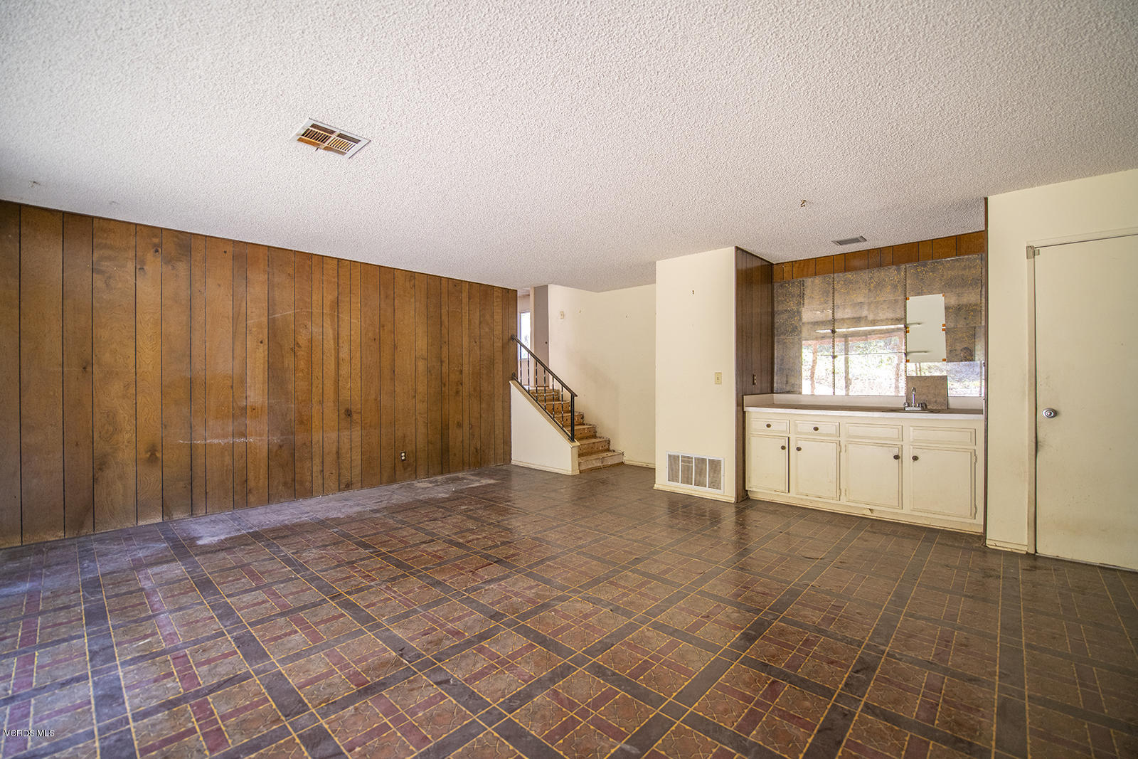 4435 Erbes Road Thousand Oaks, CA 91360 - Photo 7 of 14 a view of an empty room with a kitchen