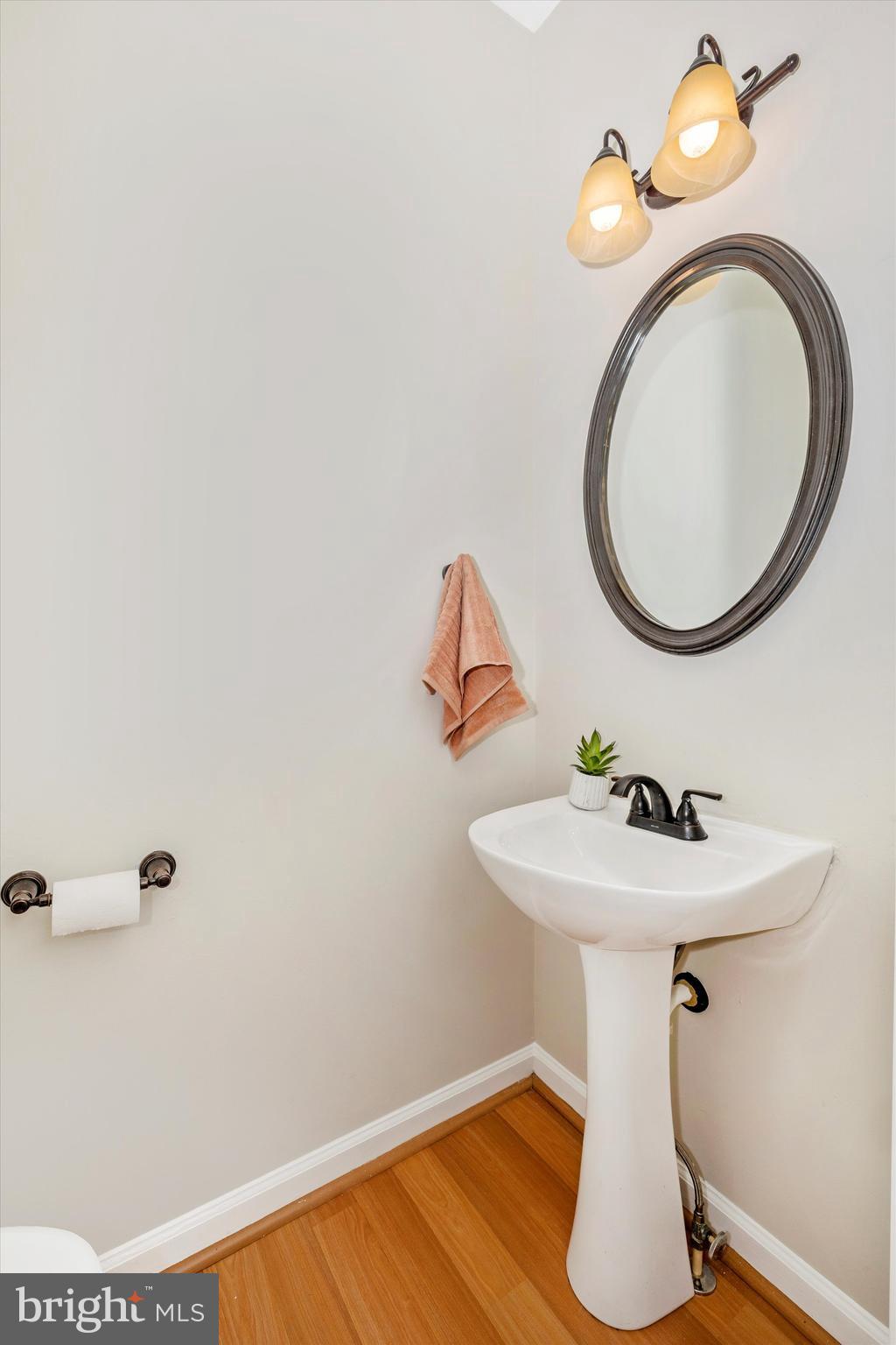 2010 Sumner Drive Frederick, MD 21702 - Photo 11 of 34 a bathroom with a sink a mirror and toilet