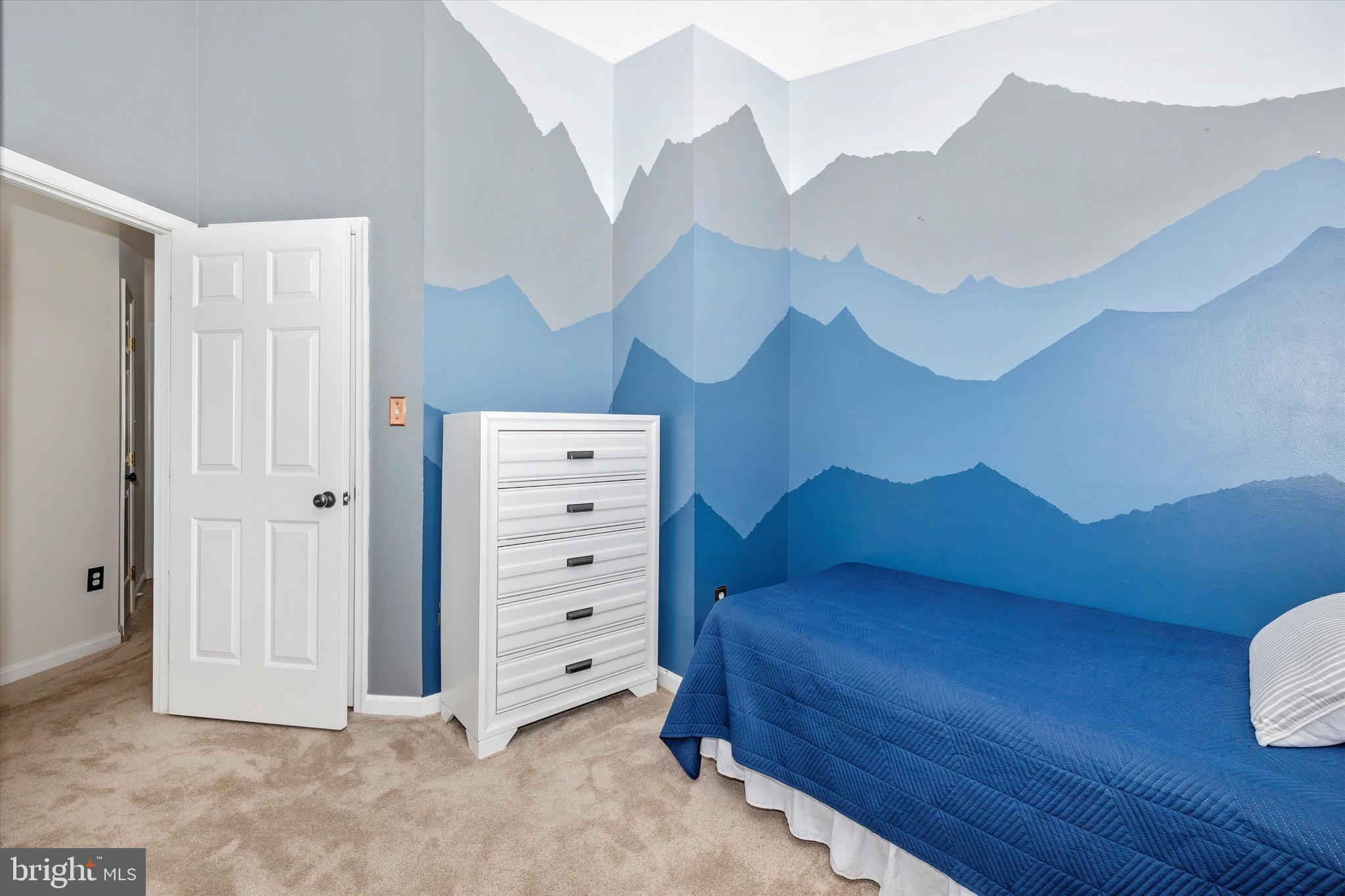 2010 Sumner Drive Frederick, MD 21702 - Photo 18 of 34 a spacious bedroom with a bed and a dresser