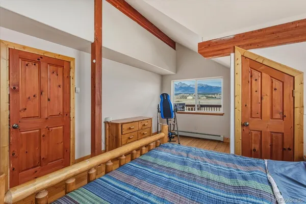 a view of a kitchen with wooden floor