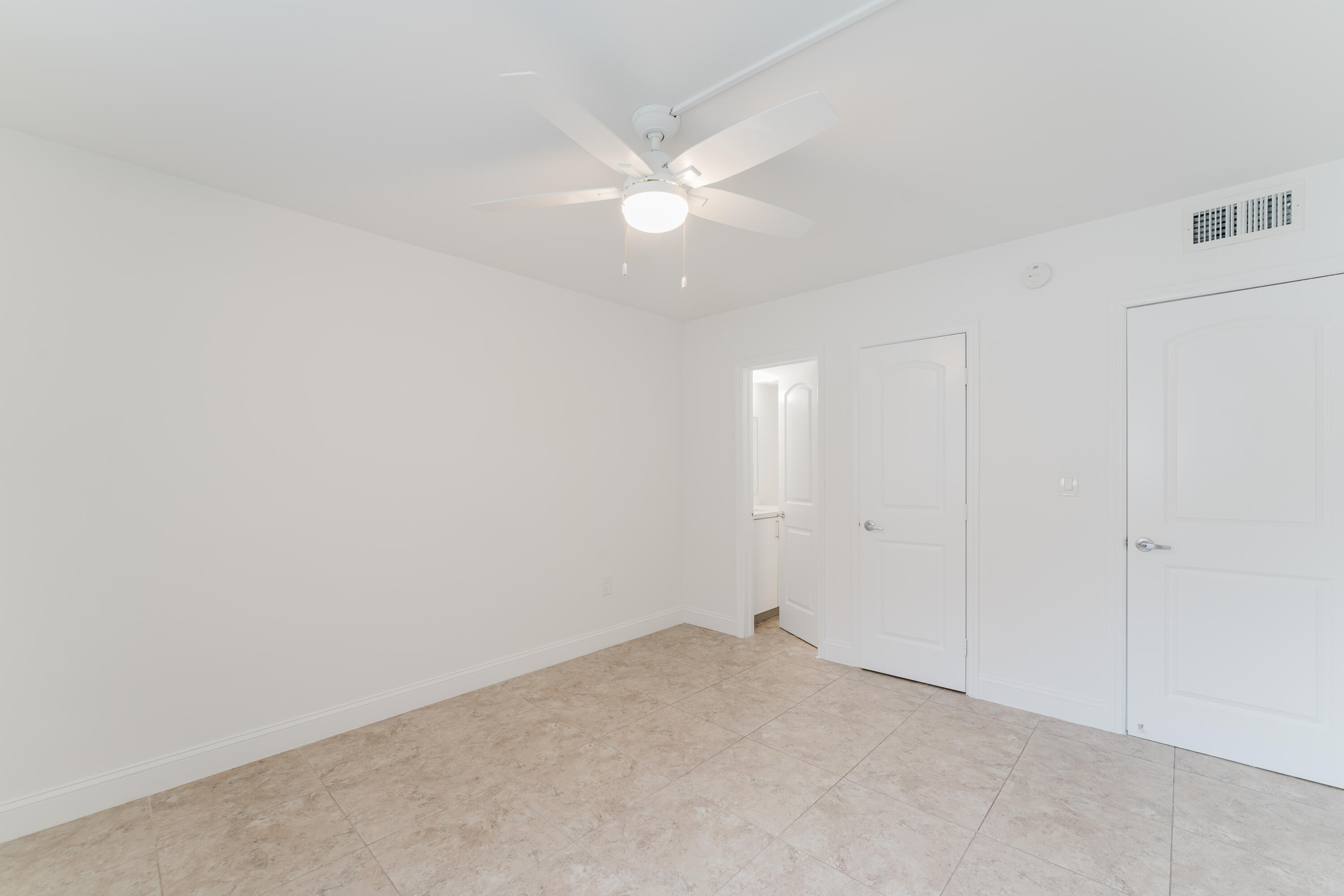 601 Southwest 2nd Avenue, Unit 5 Boca Raton, FL 33432 - Photo 21 of 26 wooden floor in an empty room