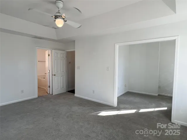 an empty room with a bathroom