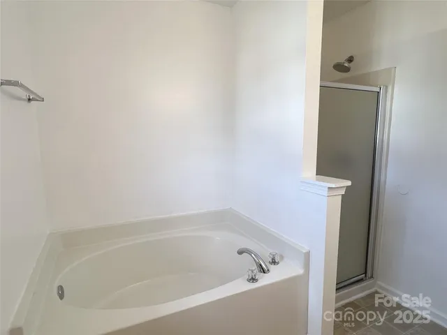 a close up of a bathtub in a bathroom