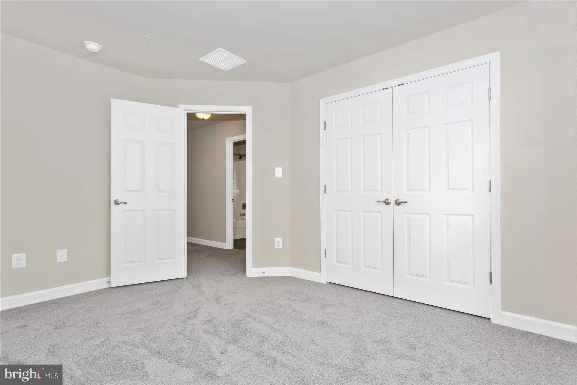 5309 Renn Road Frederick, MD 21703 - Photo 10 of 12 an empty room with closet area