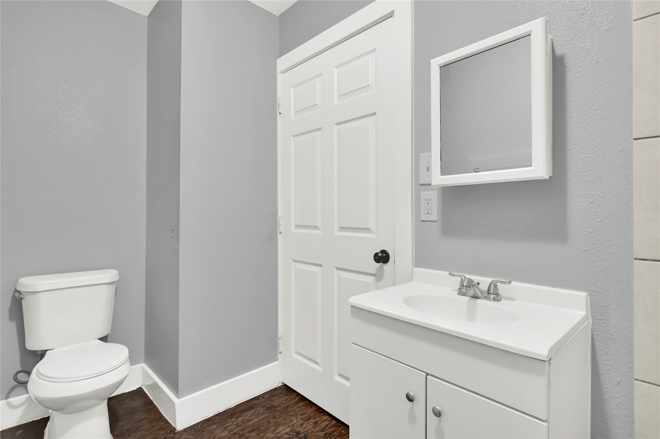 3714 Dabney Street, Unit 6 Houston, TX 77026 - Photo 9 of 15 a bathroom with a sink toilet and vanity