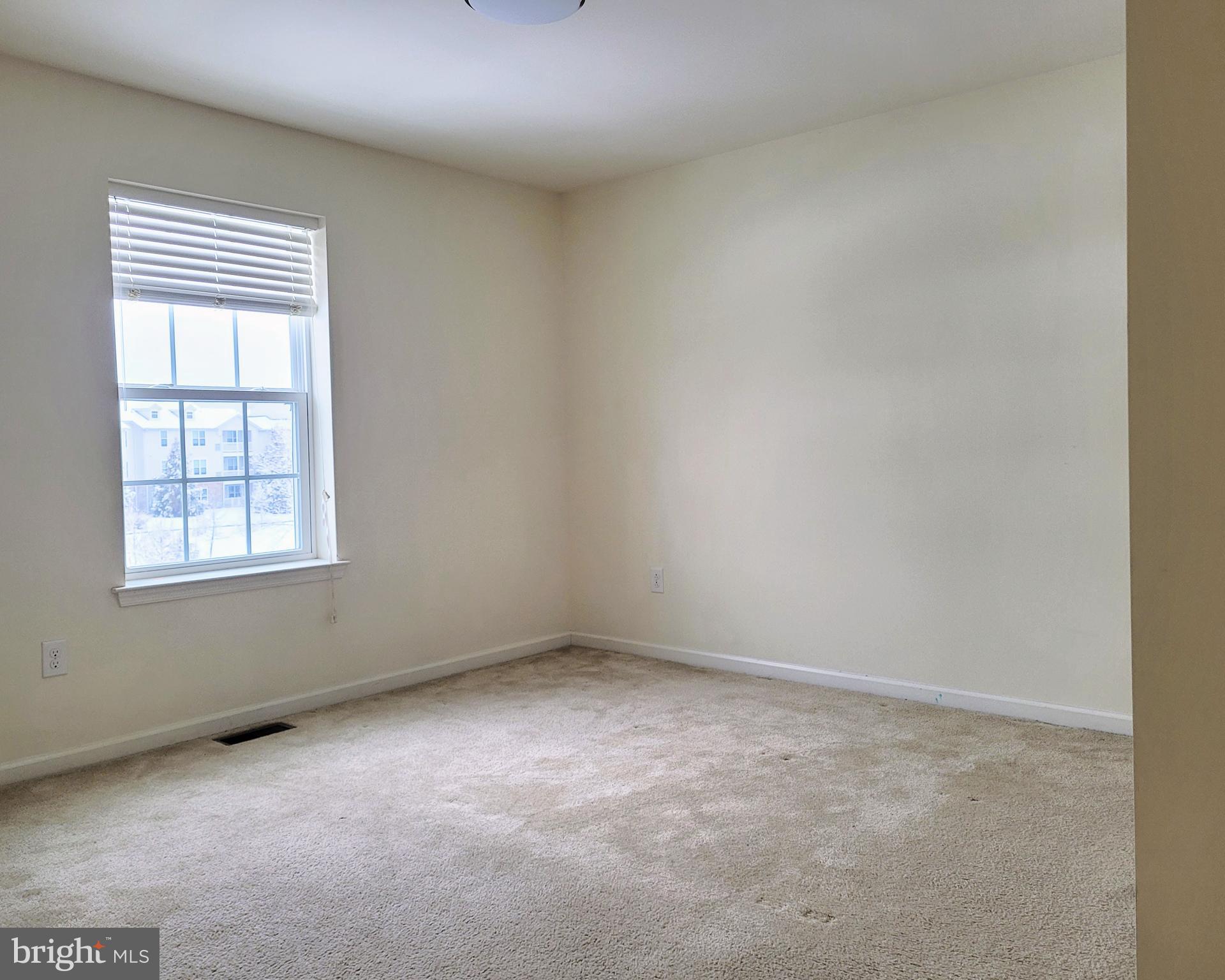 628 Rigel Way Bear, DE 19701 - Photo 16 of 20 an empty room with a window