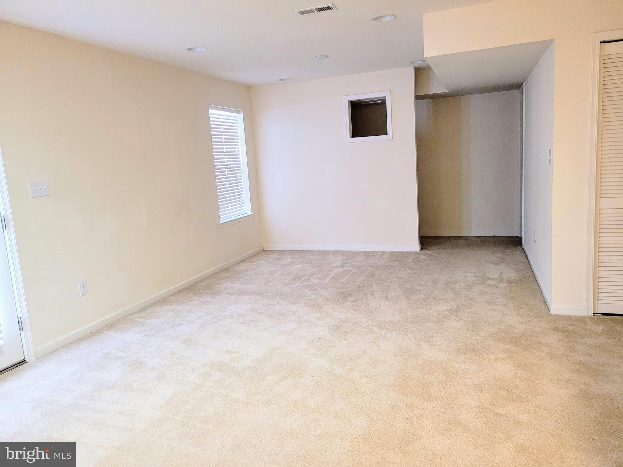 628 Rigel Way Bear, DE 19701 - Photo 17 of 20 a view of an empty room with windows