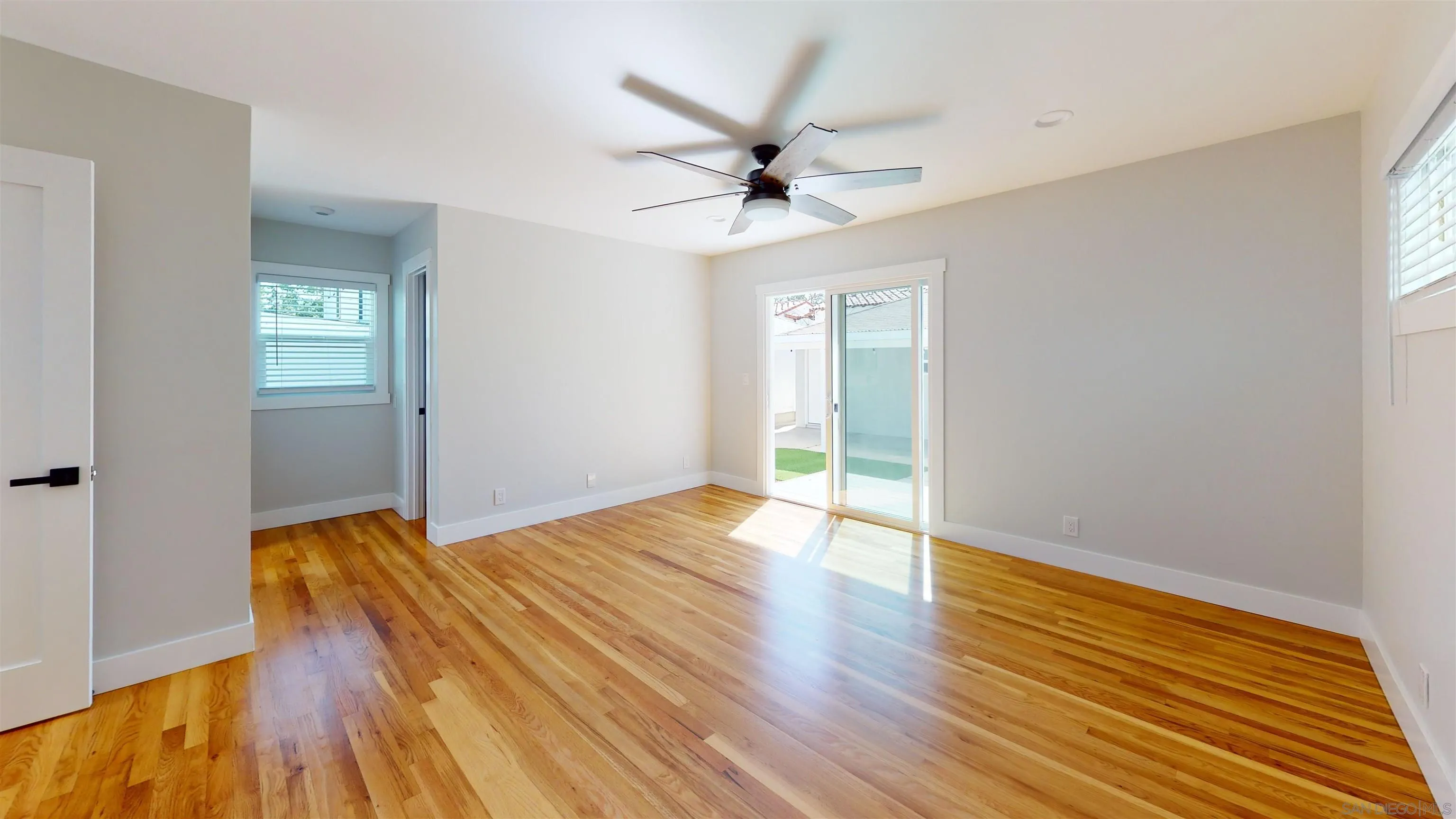 419 H Avenue Coronado, CA 92118 - Photo 11 of 32 wooden floor in an empty room with a window