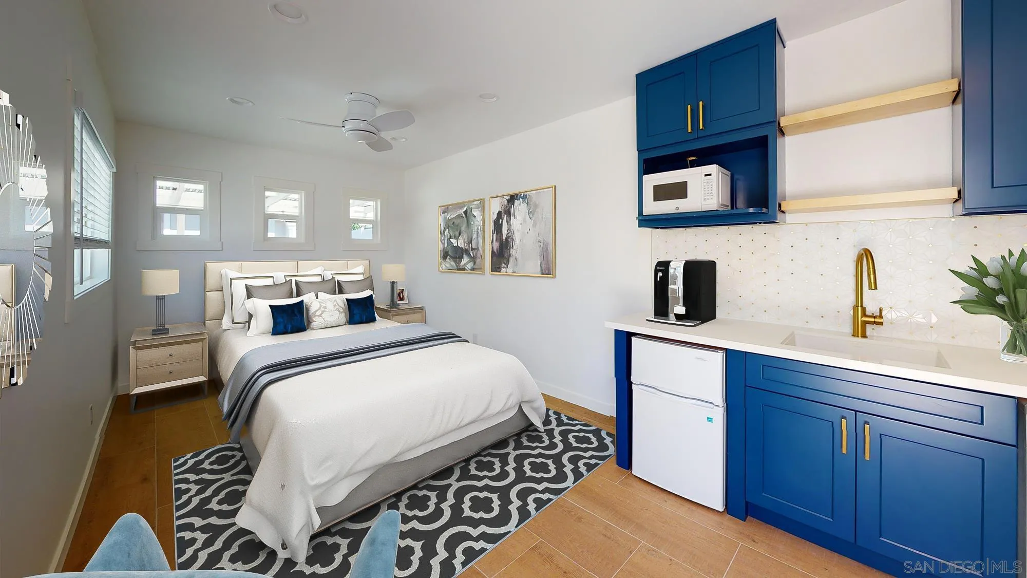 419 H Avenue Coronado, CA 92118 - Photo 20 of 32 a bedroom with a bed and a table in it