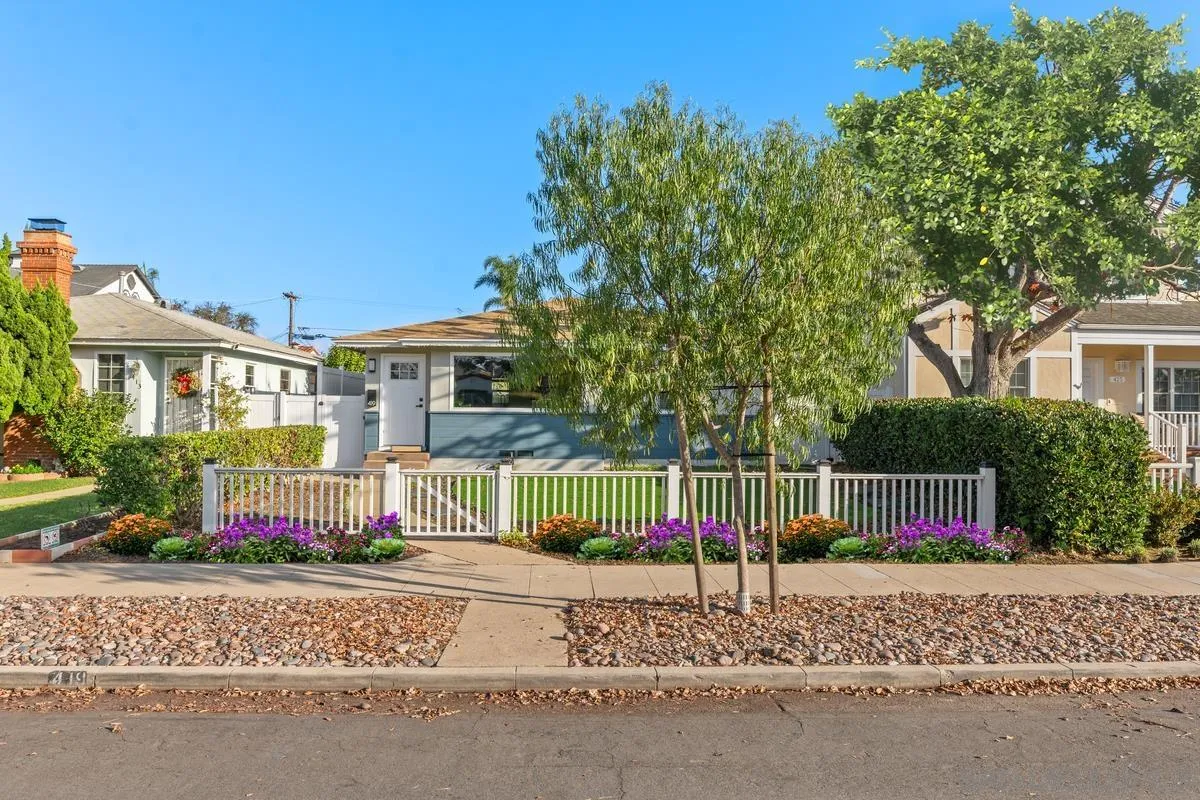 419 H Avenue Coronado, CA 92118 - Photo 2 of 32 front view of a house with a garden