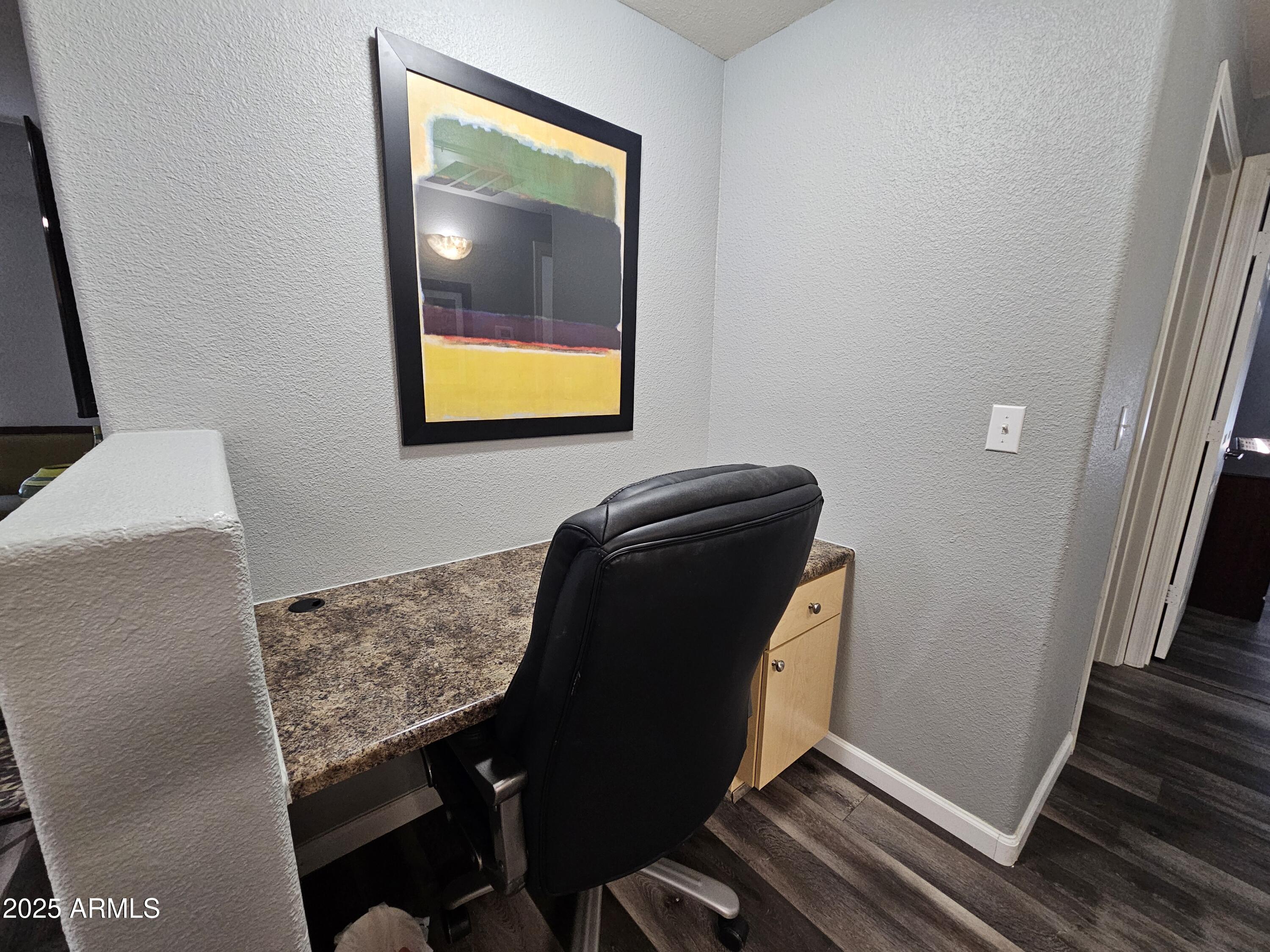 18416 North Cave Creek Road, Unit 2013 Phoenix, AZ 85032 - Photo 9 of 17 a view of workspace with wooden floor and windows