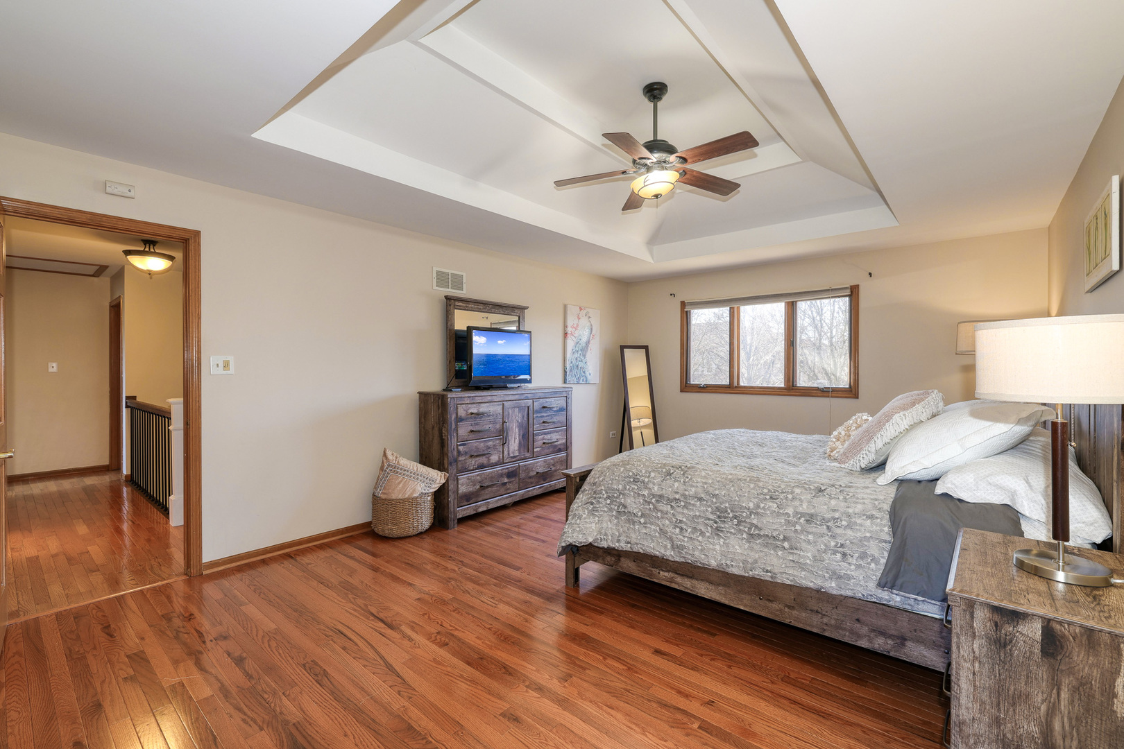 1154 Fagan Road Batavia, IL 60510 - Photo 29 of 37 a bedroom with a bed and wooden floor