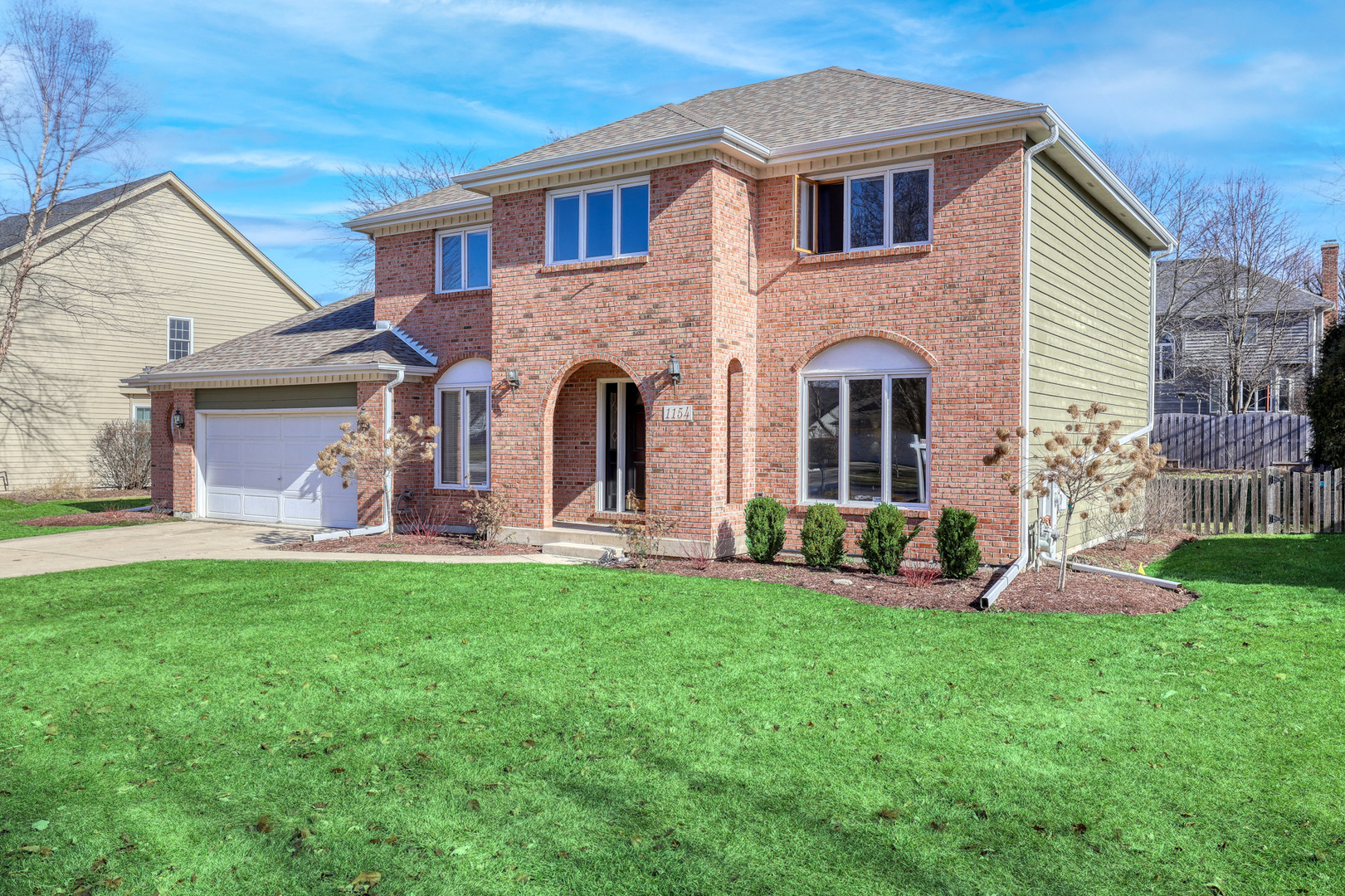 1154 Fagan Road Batavia, IL 60510 - Photo 3 of 37 a front view of a house with garden