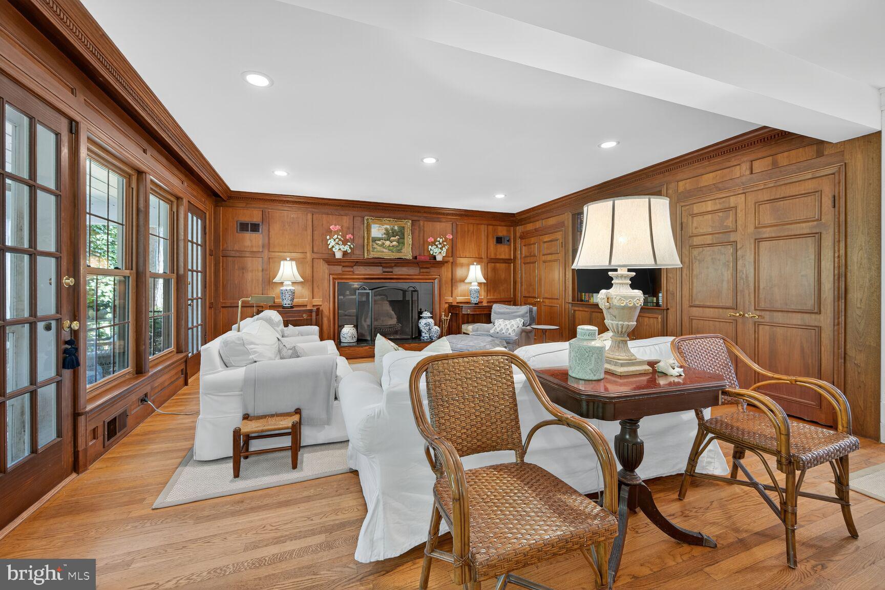 7200 Helmsdale Road Bethesda, MD 20817 - Photo 14 of 50 a living room with fireplace furniture and a table
