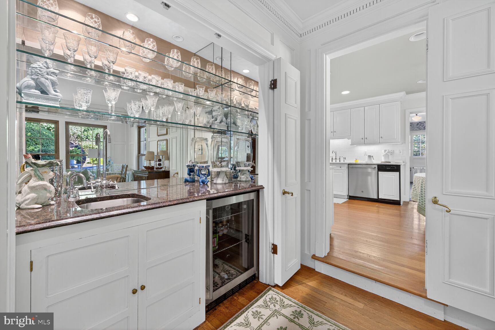 7200 Helmsdale Road Bethesda, MD 20817 - Photo 15 of 50 a kitchen with a sink and cabinets