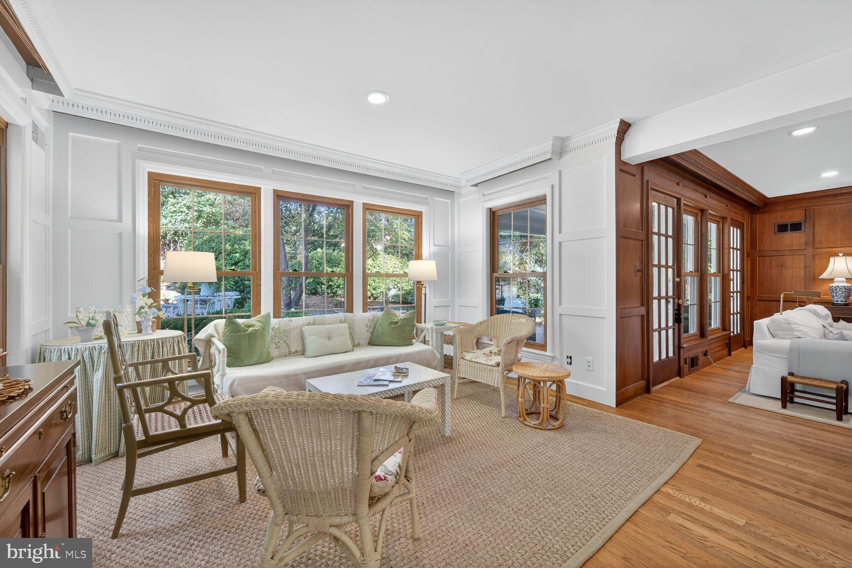 7200 Helmsdale Road Bethesda, MD 20817 - Photo 17 of 50 a living room with furniture and large windows