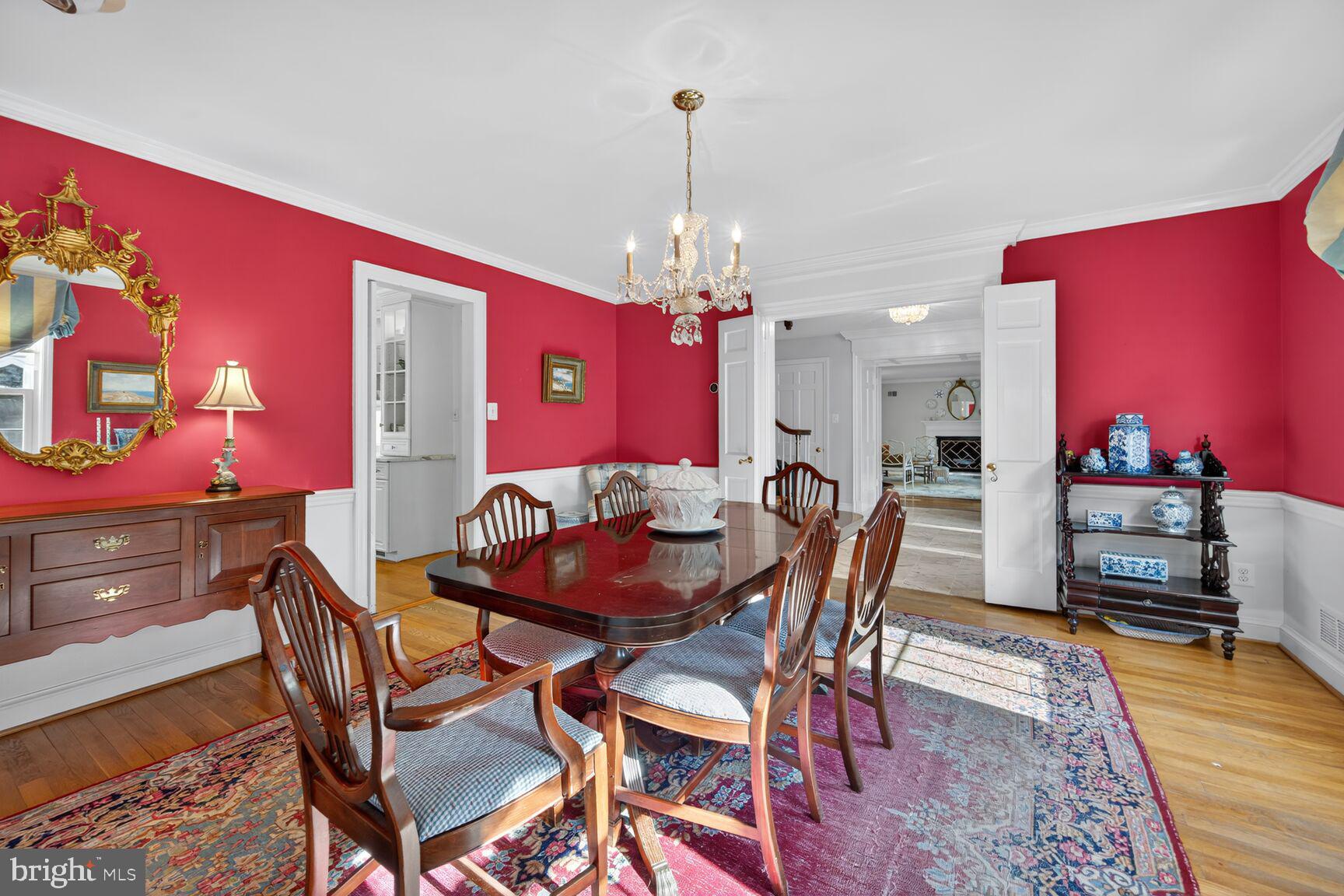 7200 Helmsdale Road Bethesda, MD 20817 - Photo 23 of 50 a view of a dining room with furniture and wooden floor