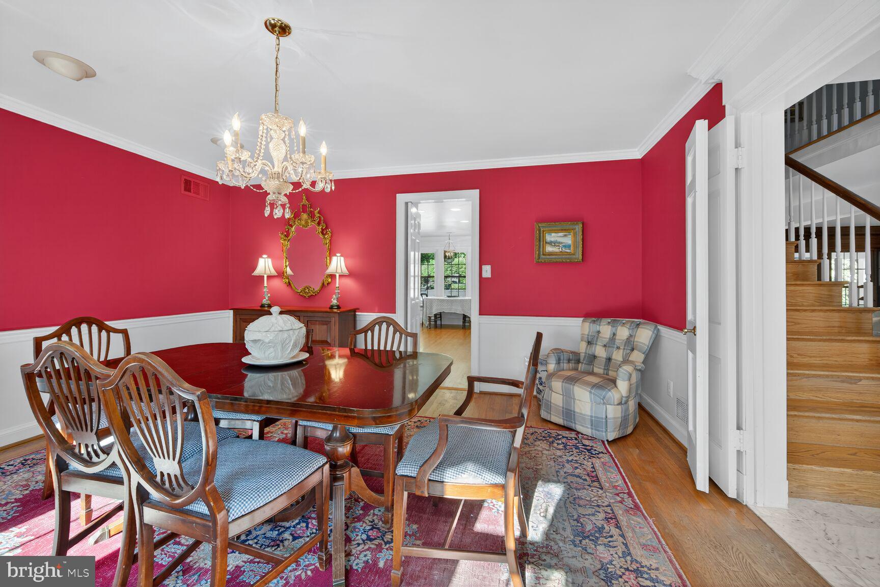7200 Helmsdale Road Bethesda, MD 20817 - Photo 24 of 50 a view of a dining room with furniture and chandelier