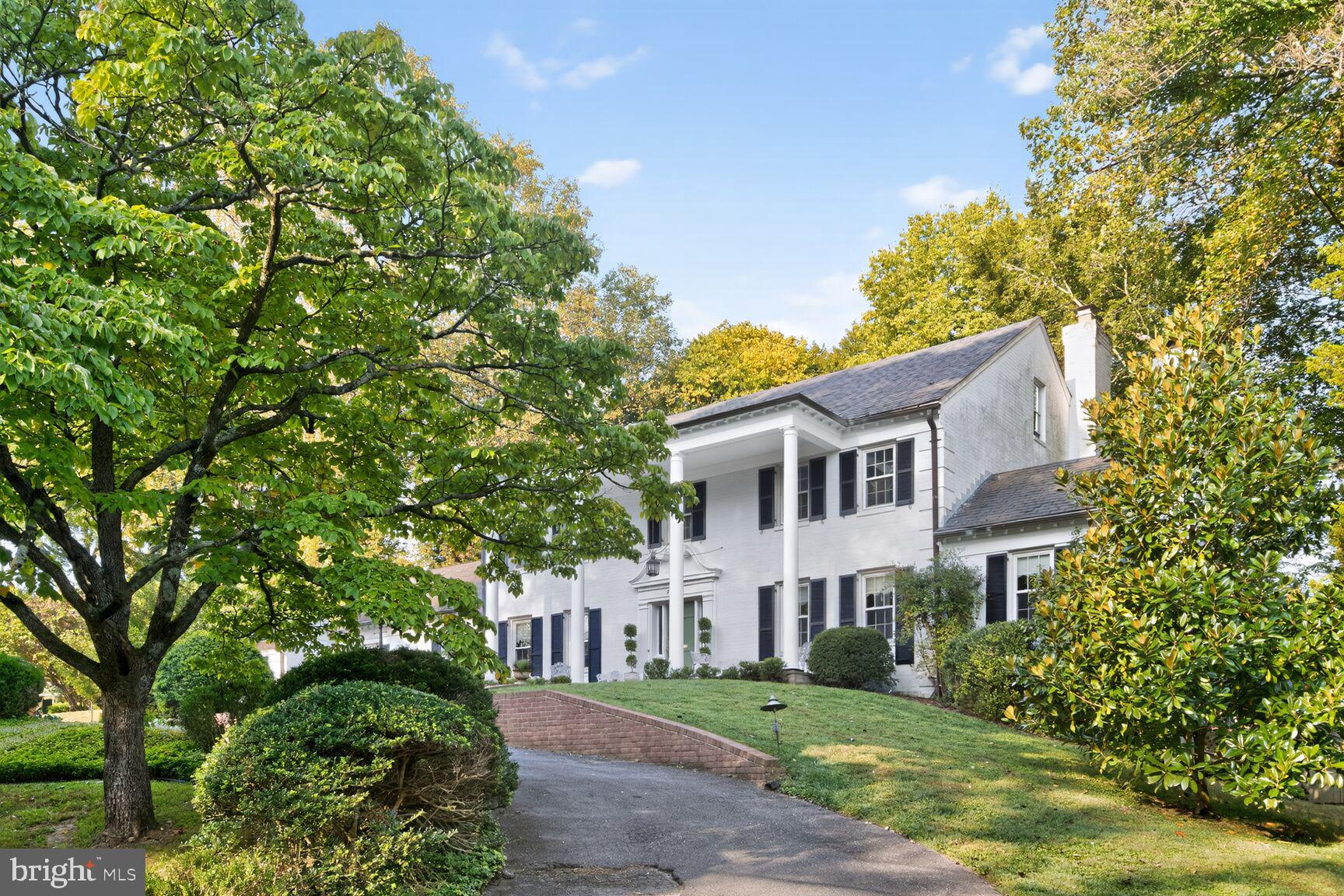 7200 Helmsdale Road Bethesda, MD 20817 - Photo 3 of 50 a house that has a tree in front of it